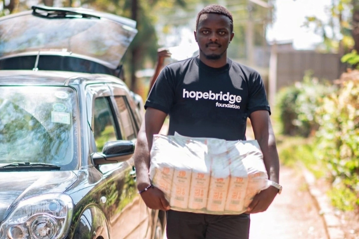 Volunteer listening to a child